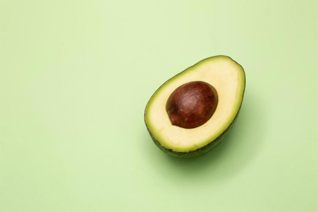 The One Trick To Know When Picking Out Avocados