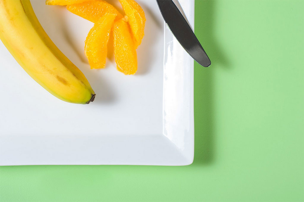 The Best Ways To Keep Your Bananas From Turning Brown